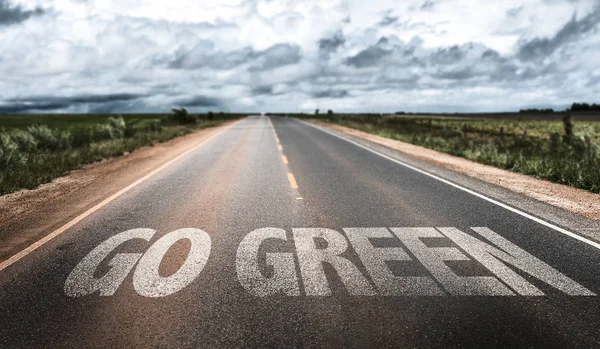 Go green sign on road — Stock Photo, Image