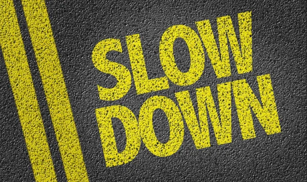 Yellow sign slow down — Stock Photo, Image