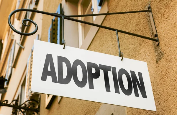 Schild mit Aufschrift Adoption — Stockfoto