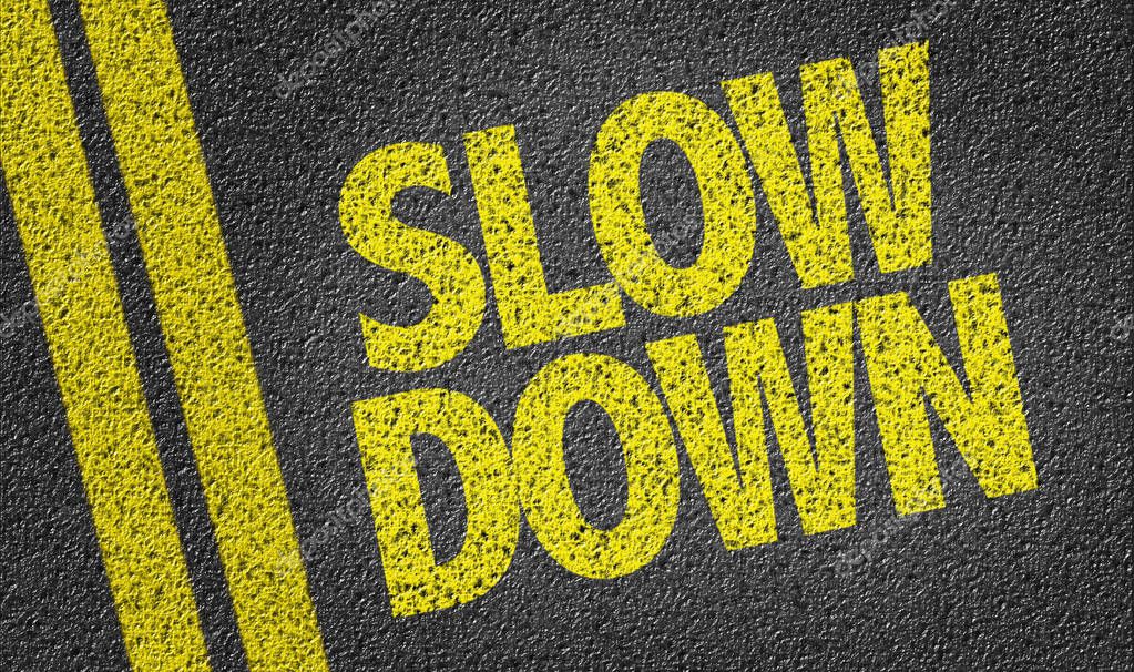 Yellow sign slow down Stock Photo by ©gustavofrazao 129800400
