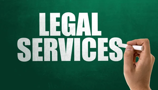 Assinar serviços jurídicos em quadro-negro — Fotografia de Stock