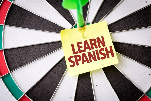 Dart hedef yazıt ile İspanyolca öğrenmek — Stok fotoğraf