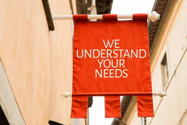 Inscription we understand your needs — Stock Photo, Image