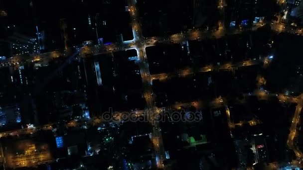 Top View of Intersection, Rooftops and illuminated streets — Stock Video