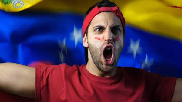 Venezuelai fickó hullámzó Venezuela zászlaja — Stock Fotó