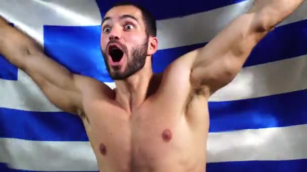 Muscular griego hombre ondeando Grecia bandera — Vídeos de Stock