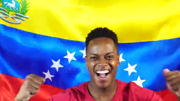 Tipo Venezolano con Bandera de Venezuela — Vídeo de stock