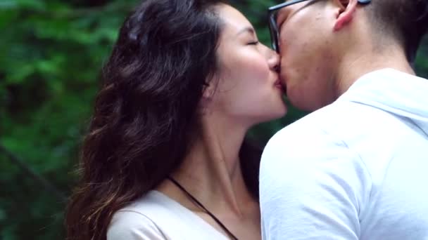 Romantic Young Asian Couple Kissing — Stock Video