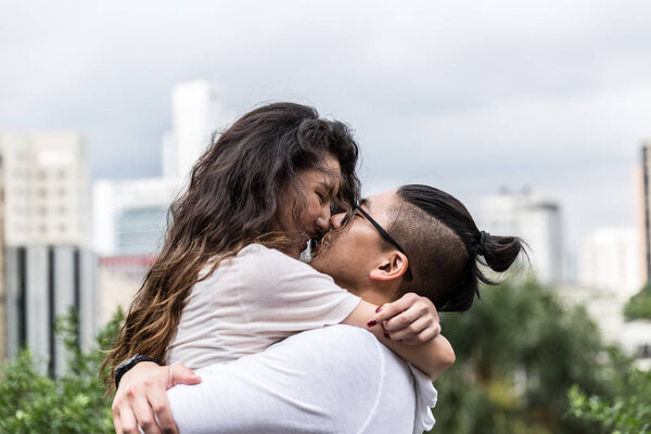 Romantic Asian Couple Meeting/Hugging