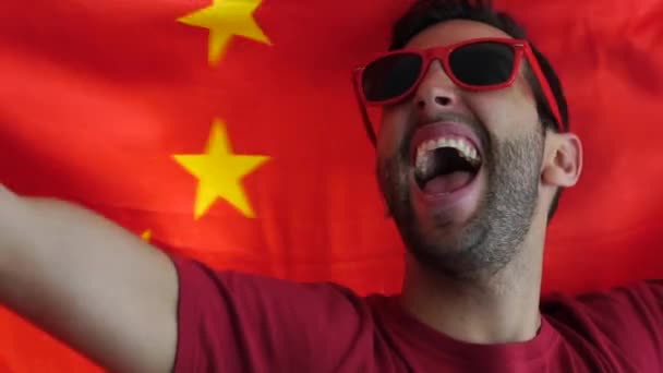 Chinese Fan Celebrating Flag — Stock Video