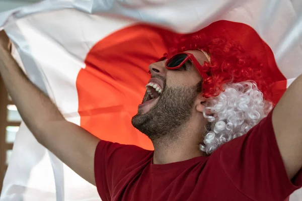 Ιαπωνικά Fan Γιορτάζει Σημαία — Φωτογραφία Αρχείου