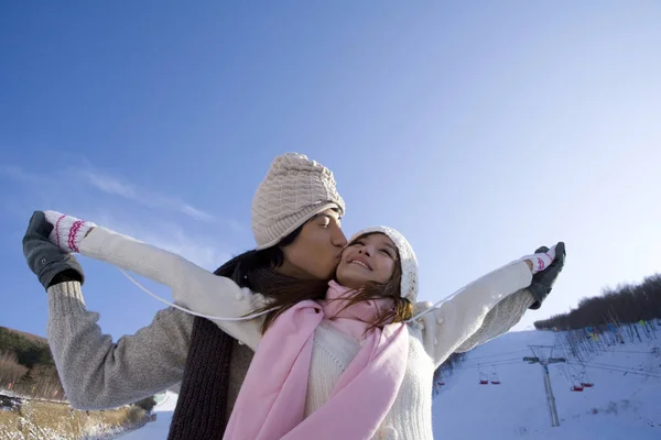 Chinese Man Kissing Woman Arms Outstretched — Stock Photo, Image