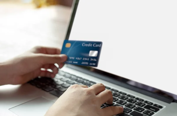 Woman Hand Holding Blue Credit Card Using Modern Laptop Typing — Stock Photo, Image