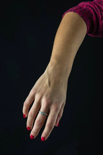 Human hand showing signs. isolated on black — Stock Photo, Image