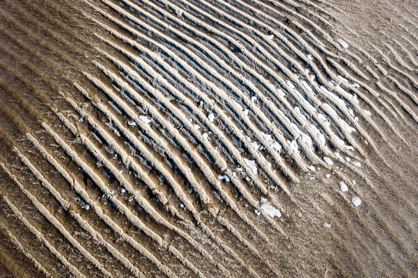 Bevroren zand met ijsblokken — Stockfoto