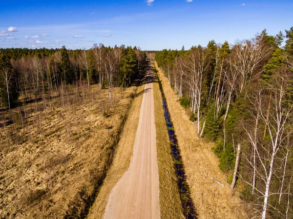 Drone image. aerial view of rural area with forest road — Stock Photo, Image