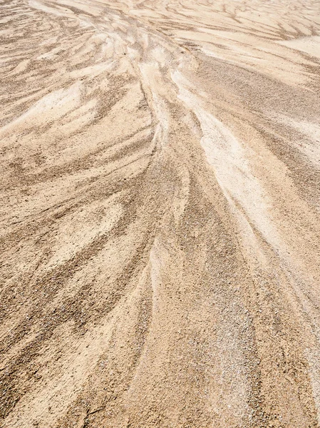 Plage rocheuse avec sable et galets — Photo