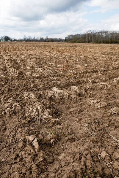 Tierras agrícolas. Surcos en tierras agrícolas — Foto de Stock