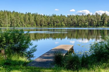 boardwalk Gölü bulutlarda yansıması