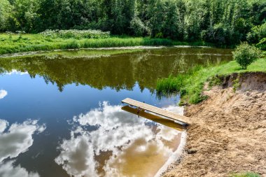 boardwalk Gölü bulutlarda yansıması