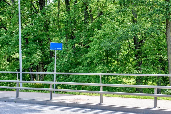 Road signs and lines on asphalt — Stock Photo, Image