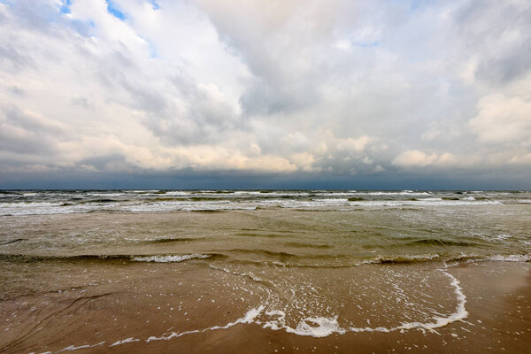 View of a stormy beach in the morning.