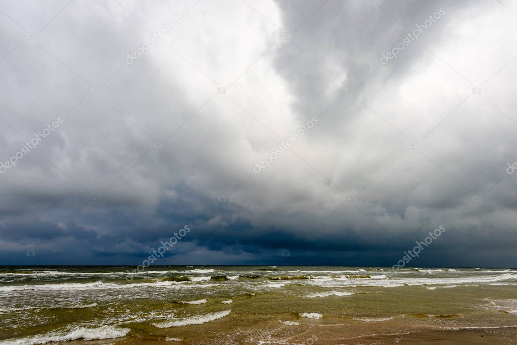 View of a stormy beach in the morning.