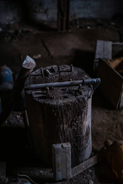 old abandoned house interior with broken furniture and empty windows. woodwork details in dust