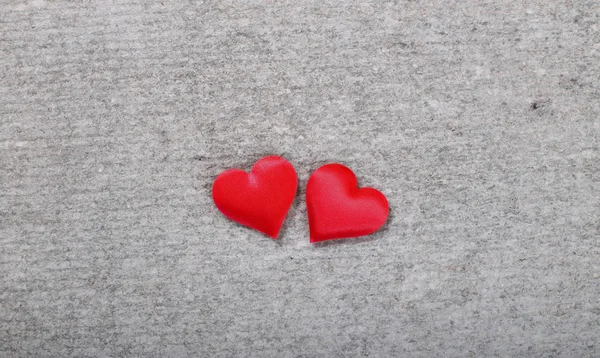 Two red hearts on a gray background — Stock Photo, Image