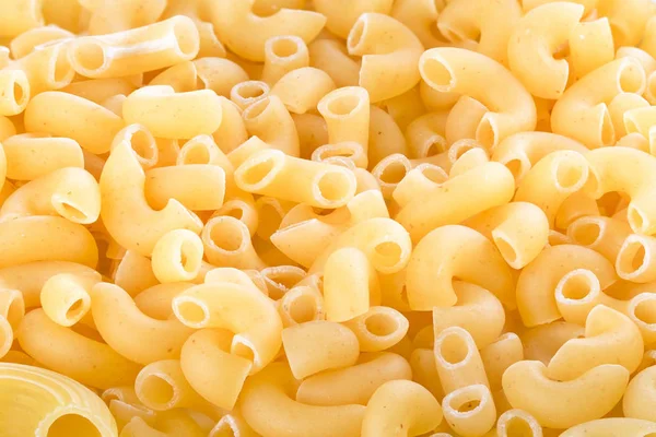 Background from semicircular pasta — Stock Photo, Image