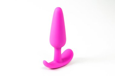 Pembe popo anal seks oyuncak beyaz zemin üzerine takın 
