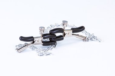 BDSM toy nipple clamp on white background clipart