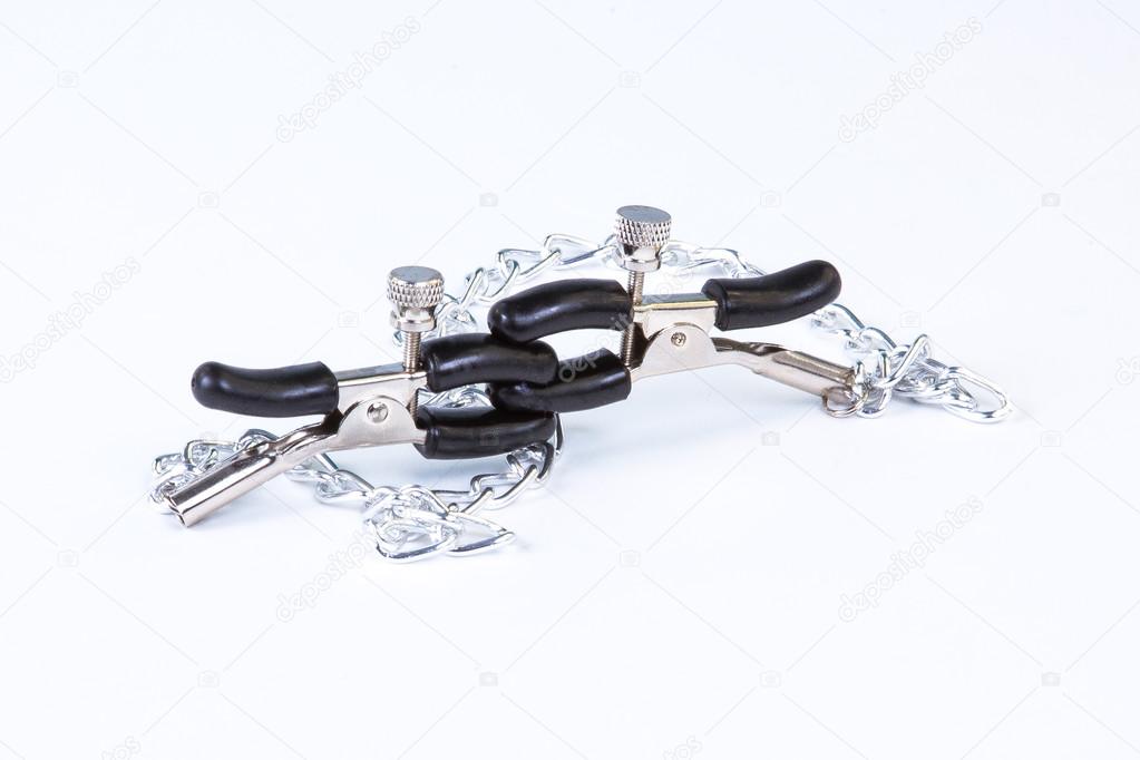 BDSM toy nipple clamp on white background