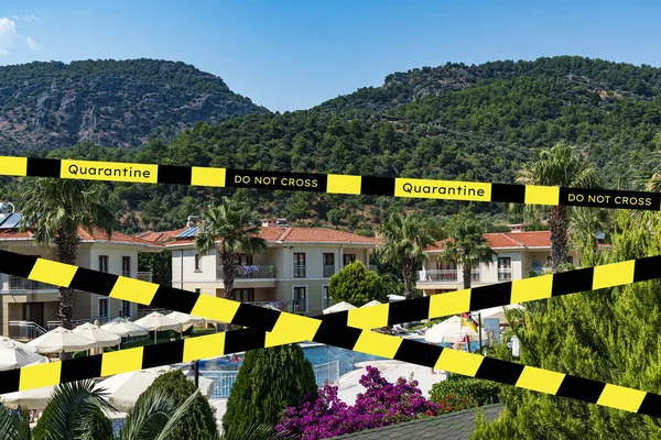 Barrier tape - quarantine, isolation, entry ban. Do not cross. Holiday vacation hotel pool
