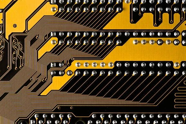 Imagem macro de placa de circuito impresso amarelo - textura PCB — Fotografia de Stock