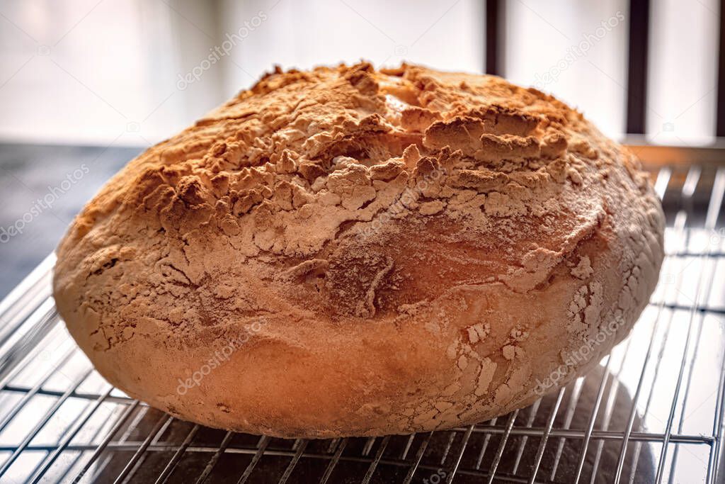 Sourdough bread is made by the fermentation of dough using naturally occurring lactobacilli and yeast.