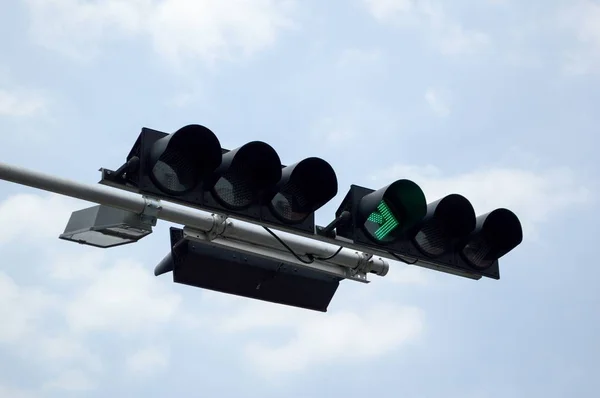 close up traffic light green in city