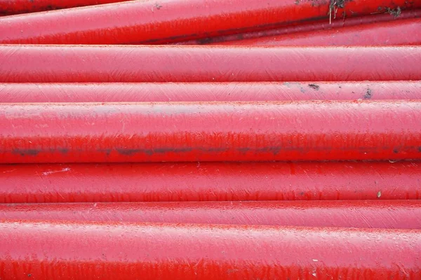 red pipe on the ground