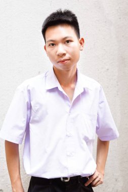 Taylandlı üniformalı öğrenciyi kapatın.