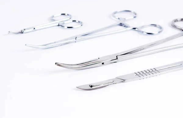 Medical instruments on a white background. Selective focus — Stockfoto