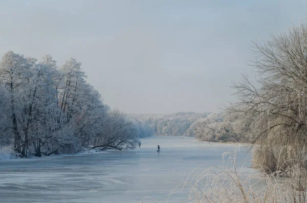 Winter fishing on frozen lake — Stock Photo, Image