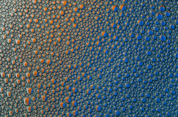 Bulles sur fond bleu rouge texture — Photo