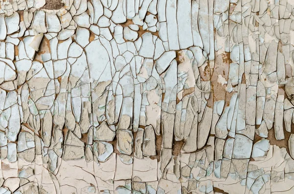 Eski bir ahşap zemine, doku soyulması beyaz boya