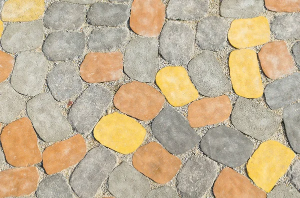 Colored concrete paving tiles texture, background