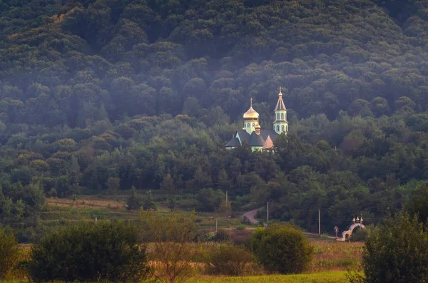 Orthodox monastery in a forest valley. Natural landscape. Transcarpathia Ukraine Stock Picture