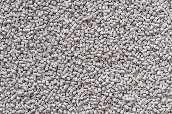 Gray polymer dye in granules, background texture — Stock Photo, Image