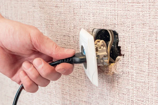 Hand Disconnects Connects Plug Broken Outlet Risk Electric Shock — Stock Photo, Image