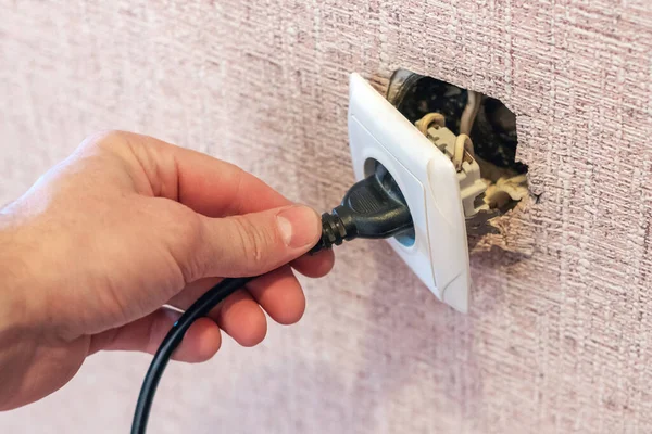 Hand Disconnects Connects Plug Broken Outlet Risk Electric Shock — Stock Photo, Image