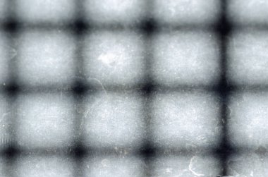 Beton zeminde bir gölge ızgara, arka plan dokusu.