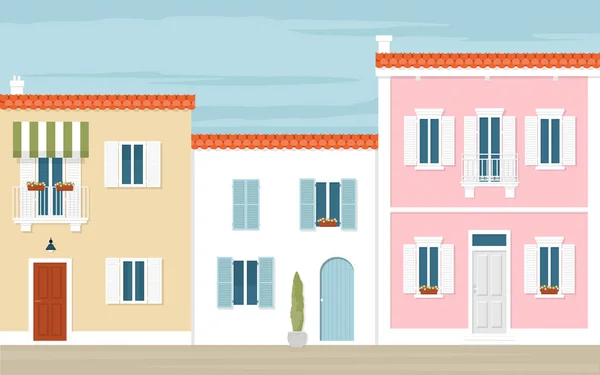Bunte Häuser in der italienischen Stadt. die mediterrane Straße. Architektur Europas. Sommerblick. — Stockvektor